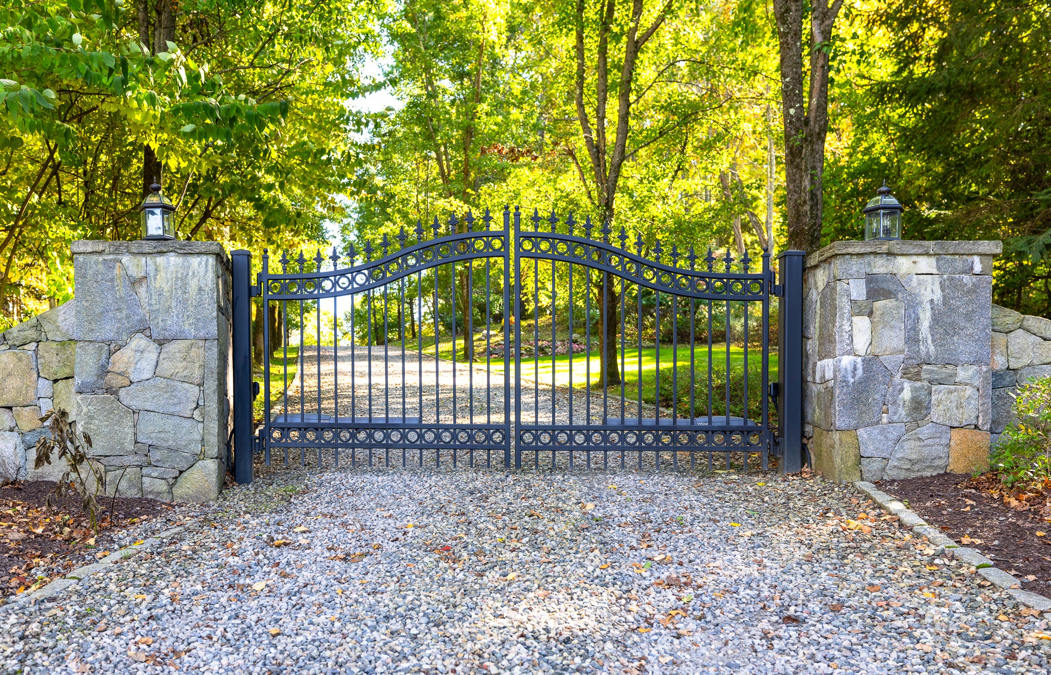 Traditional iron driveway gate by Gate Solutions